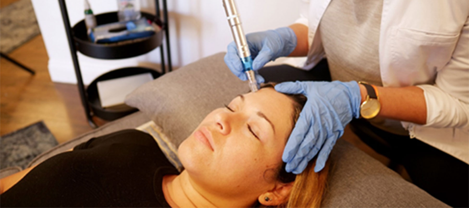 Person receiving microneedling